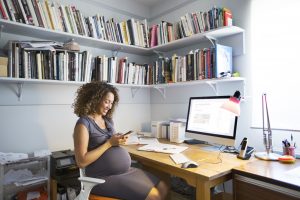 pregnant woman working from home