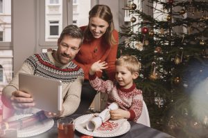 family on video call to a relative over Christmas