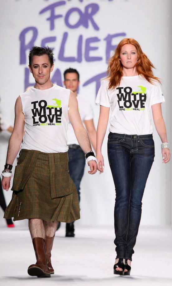 Maggie Rizer With Alan Cumming On The Catwalk At the Fashion For Relief Show At New York Fashion Week 2010