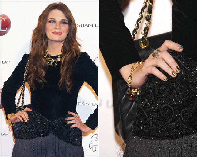 Mischa Barton attends a Cristian Lay fashion show with floral print nails