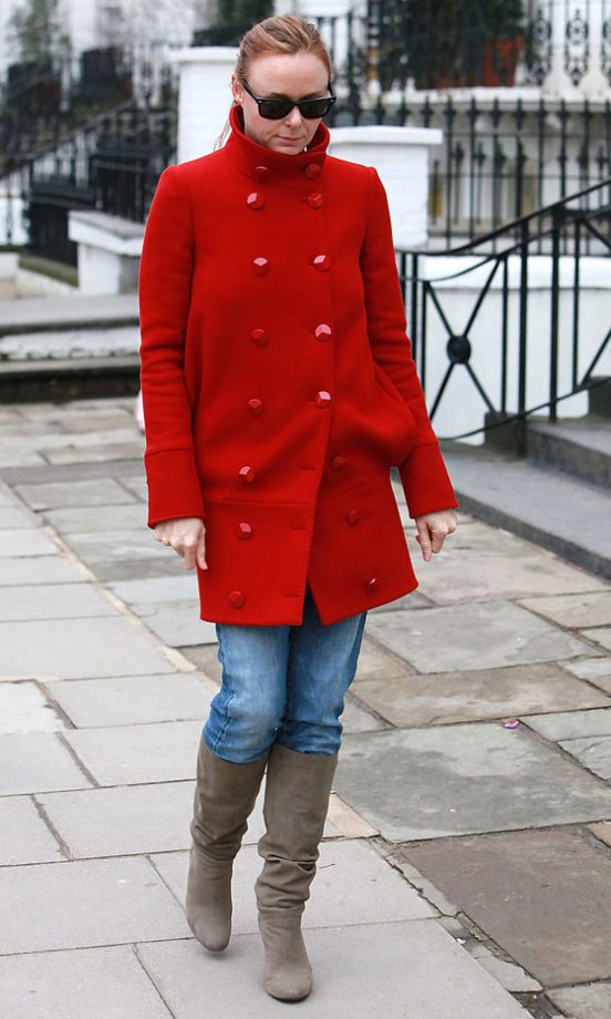 Stella McCartney Wearing A Red Coat And Grey Boots, January 2010