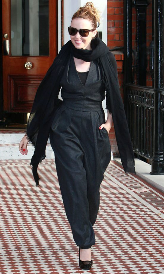 Kylie Minogue Wearing A Wide Leg Black Jumpsuit, December 2009