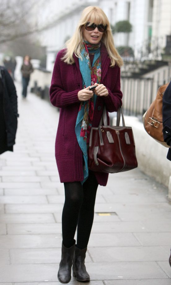 Claudia Schiffer Wearing A Purple Cardigan, D&G Bag And Matching Scarf, January 2010