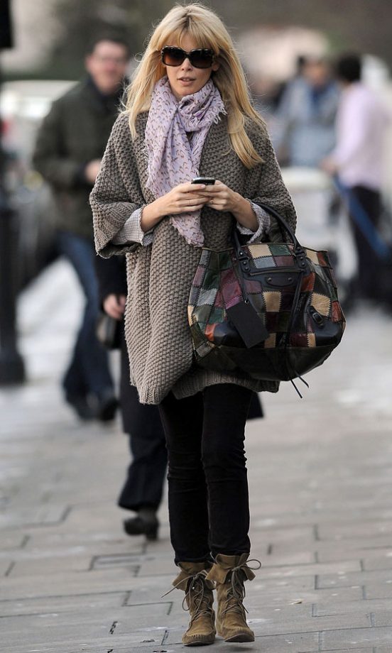 Claudia Schiffer Wearing A Grey Cardigan And Moccasin boots, December 2009
