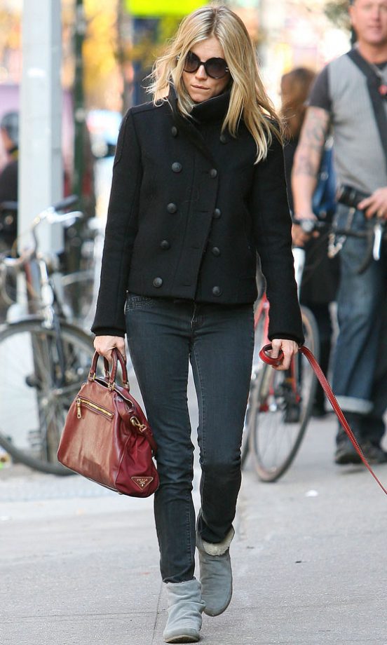 Sienna Miller Wearing A Black Jacket With A Red Prada Bag, November 2009