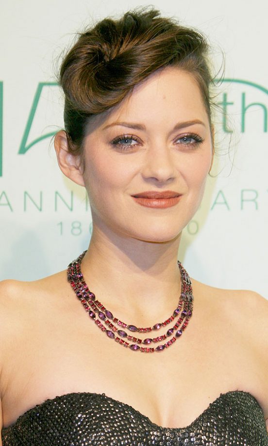 Marion Cotillard Poses With An Interesting Hairstyle At The Cannes Film Festival, 2010