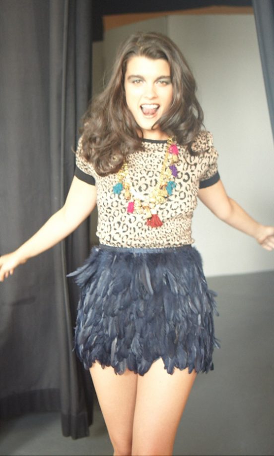 Crystal Renn Has Us Rushing Out To Buy Her Feathered Skirt And Statetment Necklace