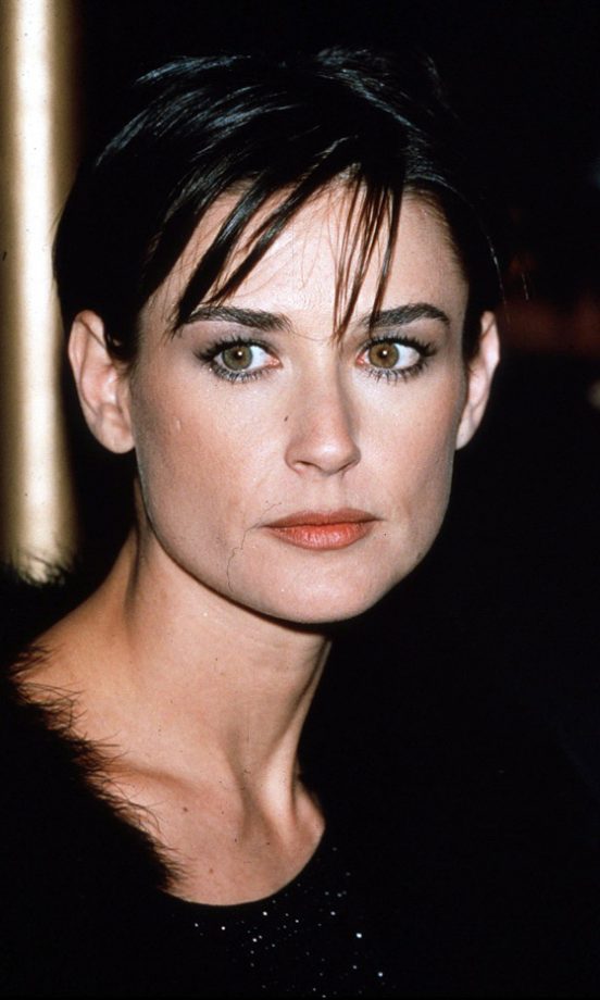 Demi Moore Looks Every Inch The Movie Star With A Black And Glossy Cropped Hairstyle, 1997
