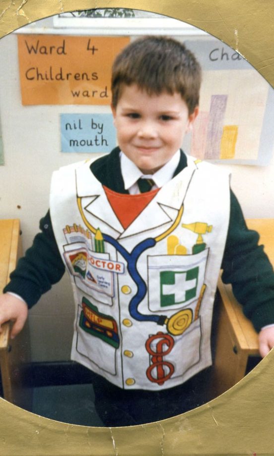 X Factor Finalist Aiden Grimshaw Dressed As A Doctor At Primary Schoool