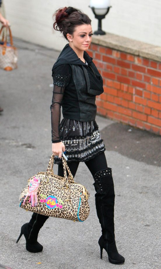 Cher Lloyd Dresses All In Black Apart From Her Paul's Boutique Leopard Print Bag At The Fountain Studios In London