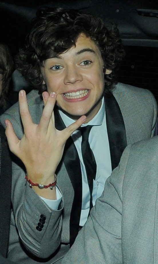 Harry Styles Jokes Around With The Paparazzi While Leaving The Pride Of Britain Awards 2010