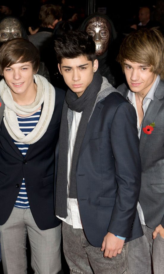 Louis Tomlinson, Zayn Malik and Liam Payne From One Direction Pose For The Cameras At The Harry Potter And The Deathly Hallows London Film Premiere 2010