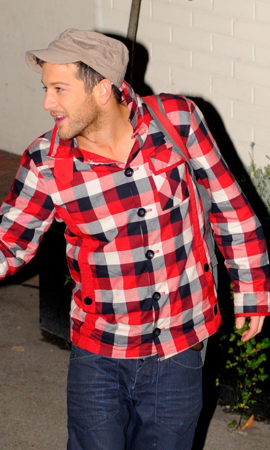 Matt Cardle Looks On Trend Wearing A Plaid Shirt And His Signature Hat