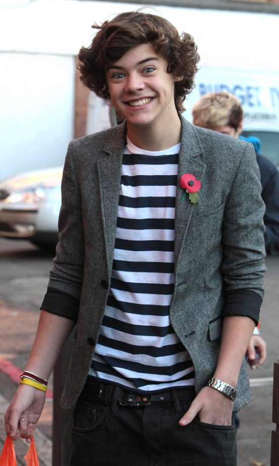 Harry Styles From One Direction Smiles Wide For Photographers While Out In London 2010