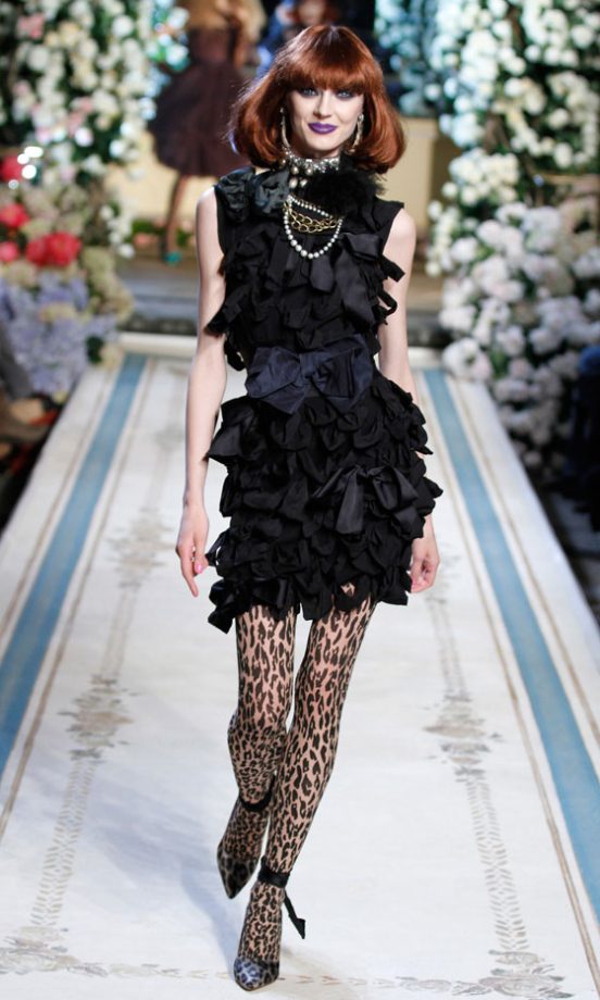 A Model Wearing A Black Sleeveless Ruffle Dress At The Lanvin For H&M Haute Couture New York Fashion Show 2010
