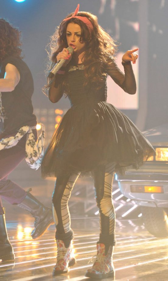 Cher Lloyd Works Her Quirky Style Wearing Floral Doc Martens With A Black Tutu Dress By Very And A Pink Headband On The X Factor 2010