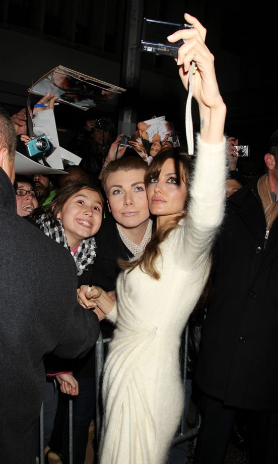 Angelina Jolie Takes Photos With Her Fans At The Premiere Of The Tourist In New York, 2010