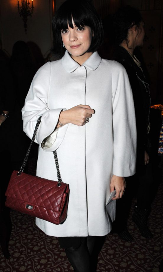 Lily Allen Wraps Up In Style In A White Coat And Carrying A Chanel Bag At The Miu Miu London Store Opening Party 2010