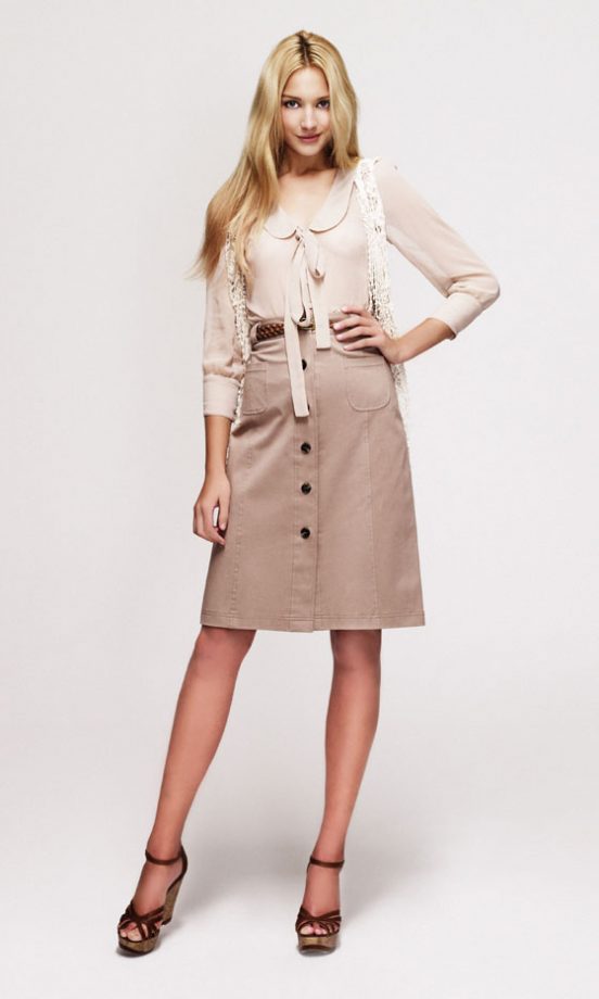 New Look Crochet Waistcoat, £17.99, Pussy Bow Blouse, £15.99, Skirt, £26.99 And Tan Wedges, £24.99 - In Stores Soon