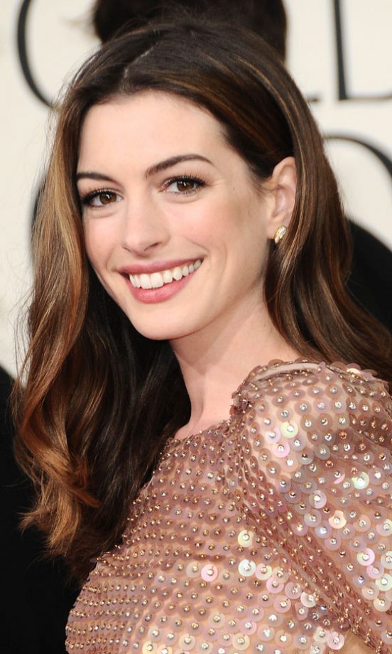 Classic Beauty: Anne Hathaway With A Highlighted Tousled Hairstyle At The Golden Globe Awards, 2011