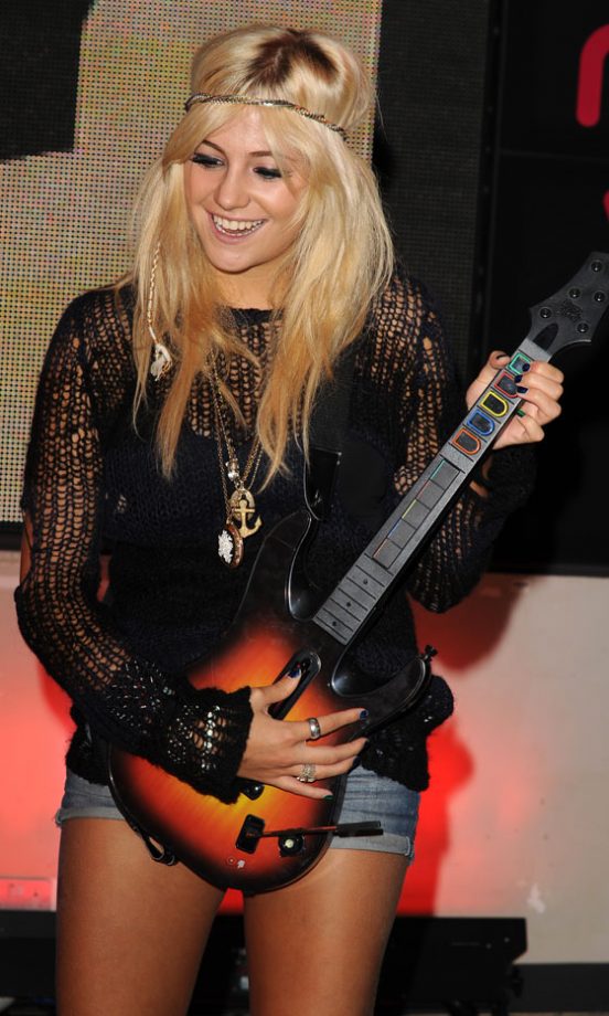 Pixie Lott Rocke Out In A Black Lace Top And Denim Shorts, September 2009