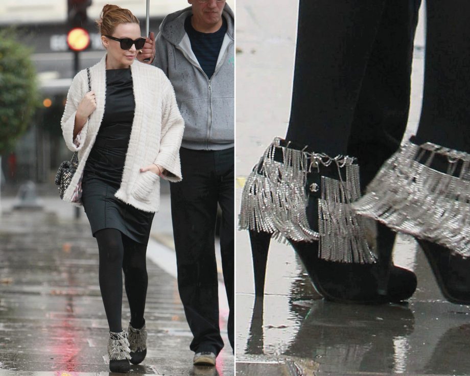 Kylie Minogue shows off her chain detail Chanel ankle boots while out and about in London