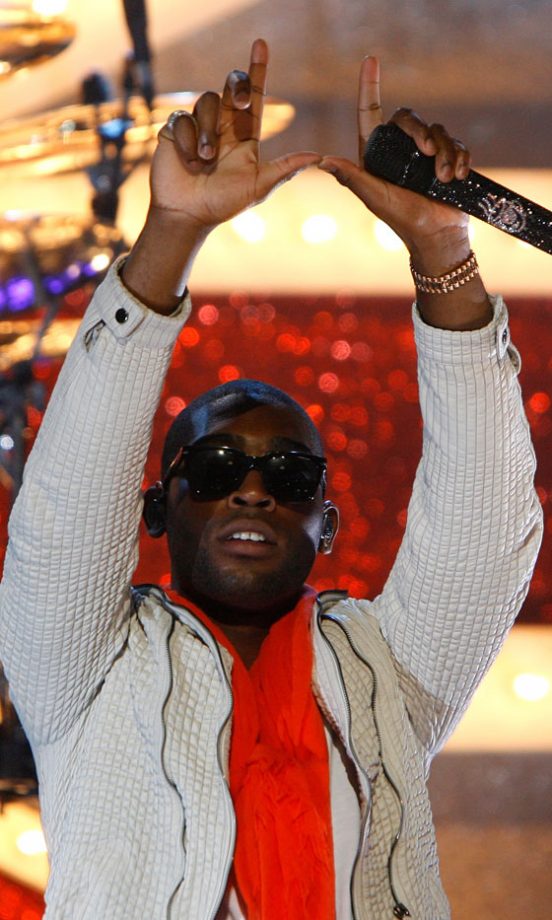 Tinie Tempah Celebrates His Four Nominations On Stage At The Brit Awards 2011 Nominations Party