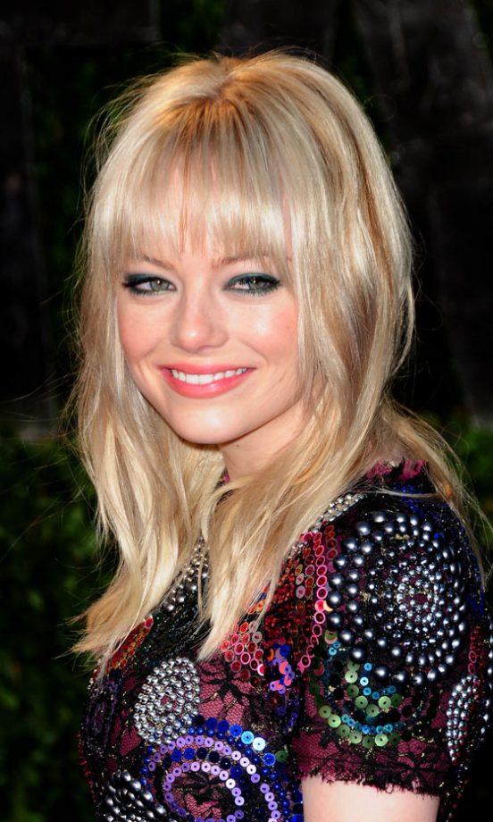 Emma Stone With A Shaggy Fringe Hairstyle At The Vanity Fair Oscar After-Party 2011