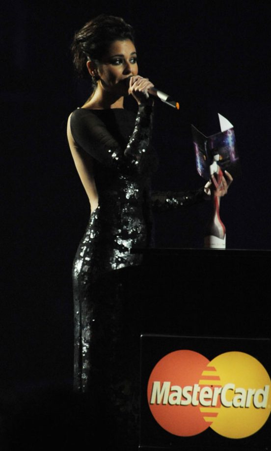 Cheryl Cole Announces Rihanna As The Winner Of The Best International Solo Artist Award On Stage At The Brit Awards 2011