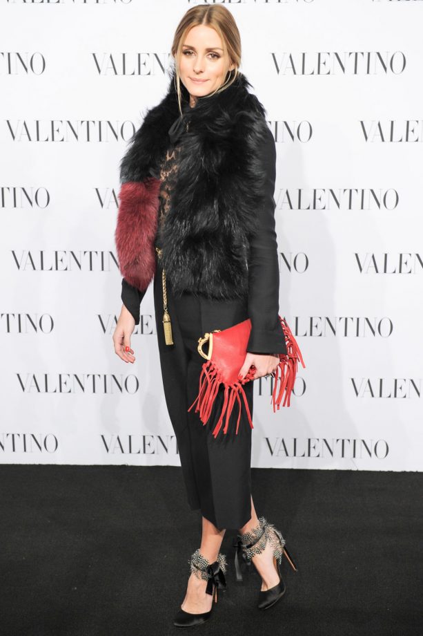 Olivia Palermo In A Fur Lined Coat And Bright Fringed Clutch At A Valentino Sala Bianca 945 Event In New York, 2014