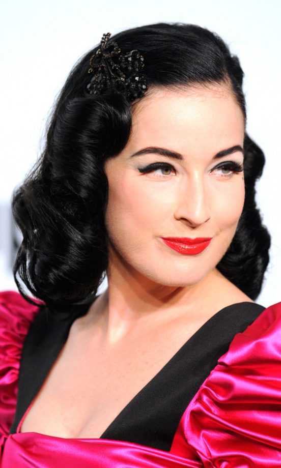 Dita Von Teese Matches Her Black Hair Accessory To Her Hair At The amfAR's Inaugural Event, 2009