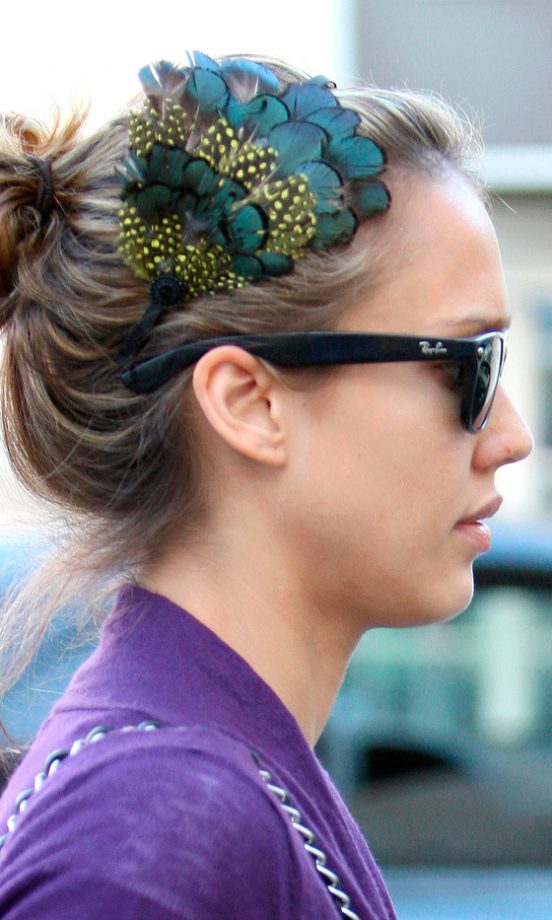 Jessica Alba Dresses Up A Messy Bun With A Feather Hair Accessory In LA, May 2009