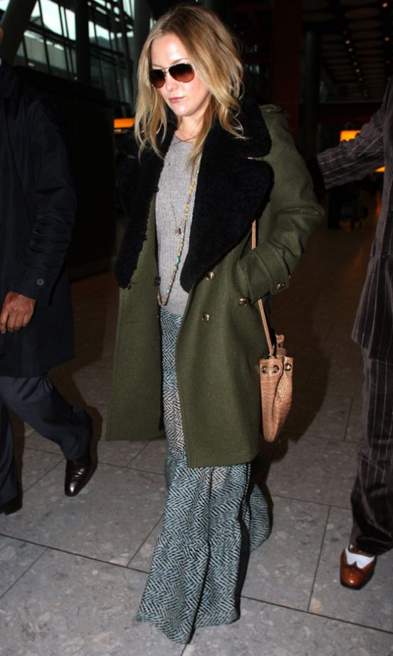 Kate Hudson Looks Effortlessly Stylish While Travelling In A Comfy Maxi Skirt And Military Coat, 2011
