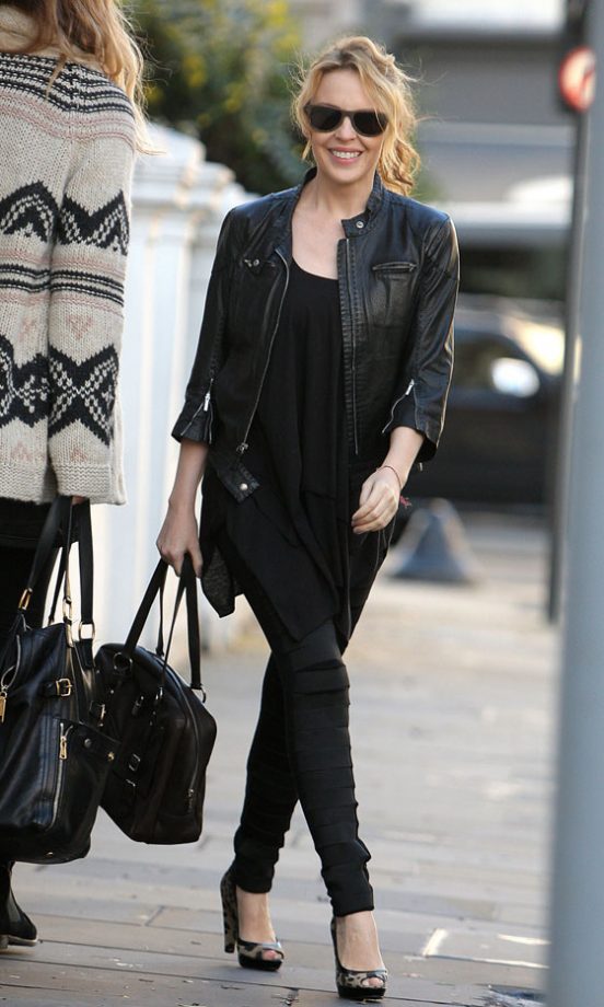 Kylie Minogue Adds Her Own Feminine Touch To Her Biker Look With Leopard Shoes, 2011