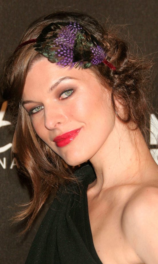 Milla Jovovich Sports A Peacock Feather Headband At The Montblanc Signature For Good Charity Gala, February 2009