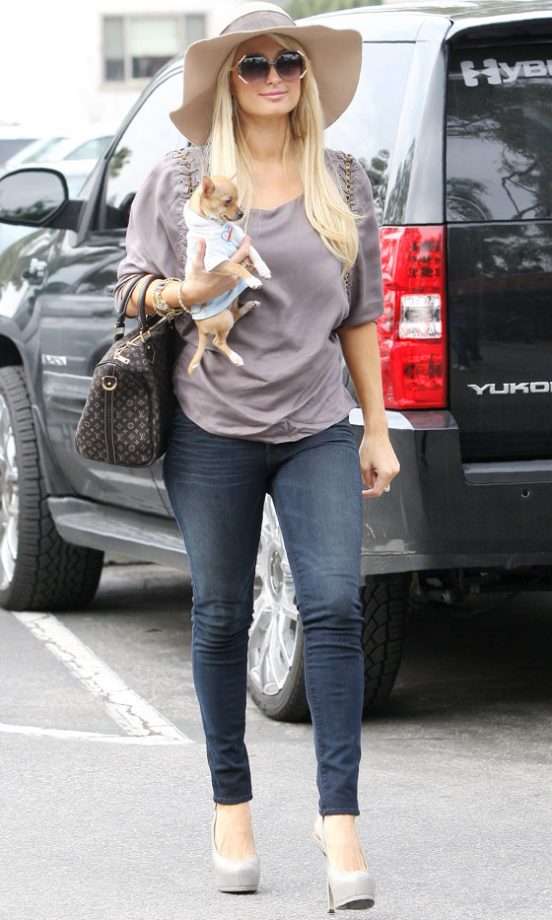 Trust Paris Hilton To Accessorize Her Weekend Outfit With Killer Heels And A Pooch, 2011