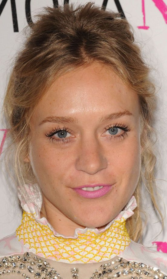Chloe Sevigny Works Quirky Cool With A Pink Lip And Messy Updo Hairstyle, 2010