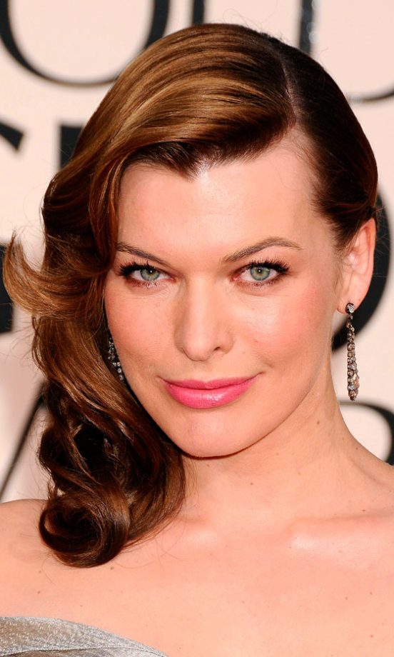 Milla Jovovich Shows Off Her Pink Lipstick With A Side Swept Hairstyle, 2011