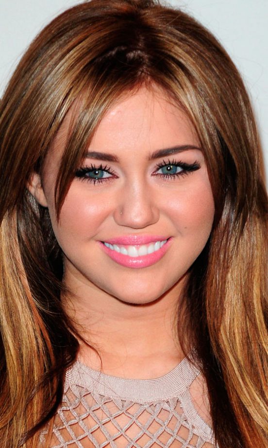 Miley Cyrus Accentuates Her Smile With Glossy Pink Lipstick, 2011