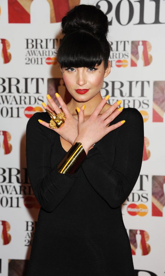 Singer Yasmin Shows Off Her Yellow Nails, 2011