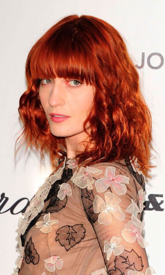 Florence Welch's Trademark Fiery Hair Is Kept Up To Date With A Blunt Cut And Perfect Fringe, 2011