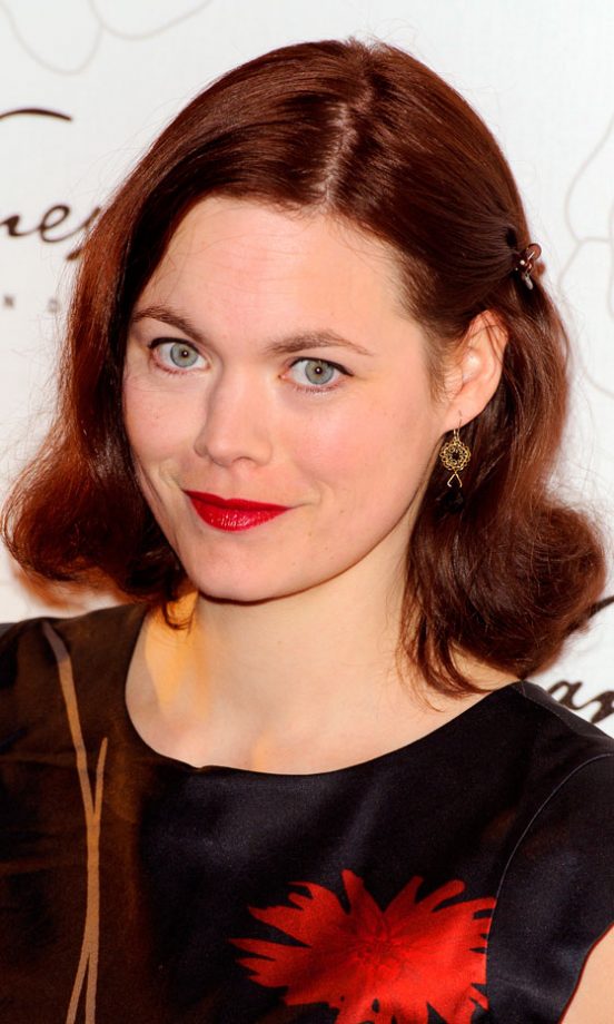 Jasmine Guinness Puts A Retro Spin On Her Short Hairstyle With Curled Ends And A Sweet Clip, 2011