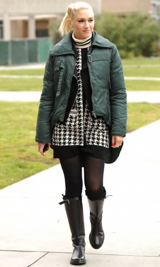 Gwen Stefani Is Certainly Embracing The British Lifestyle In A Houndstooth Dress, Wellie Boots And Padded Jacket, 2011