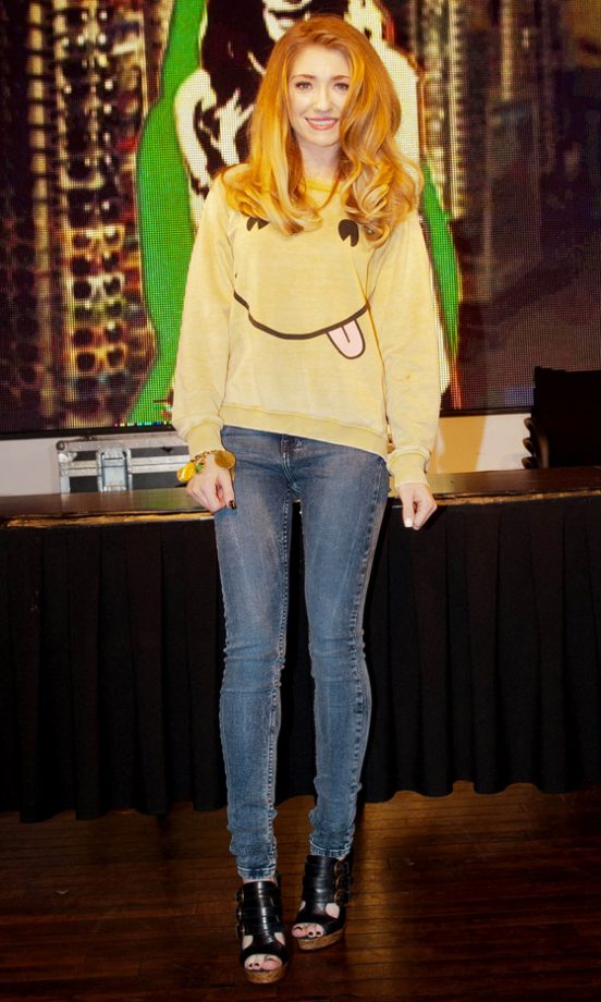 Nicola Roberts Wears A Smile And A Cheeky Jumper At Her Album Launch, 2011