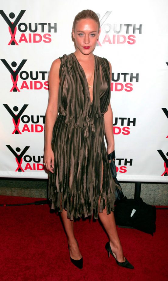 Chloë Sevigny Pairs Her Fringed Dress With A Sleek Ponytail Hairstyle And Red Lipstick Look, September 2004