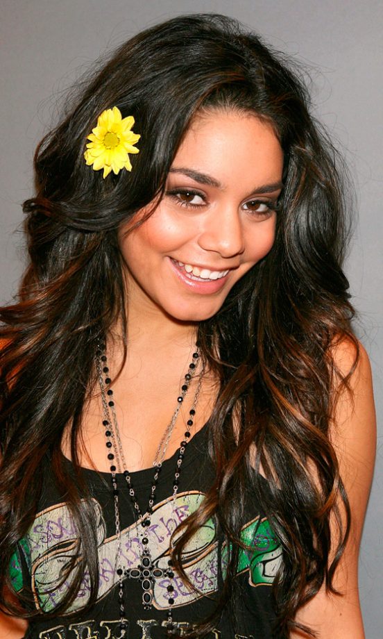 Vanessa Hudgens Looks Young And Youthful Wearing A Yellow Fower Hair Accessory At The Vanessa Hudgens Photocall, May 2006