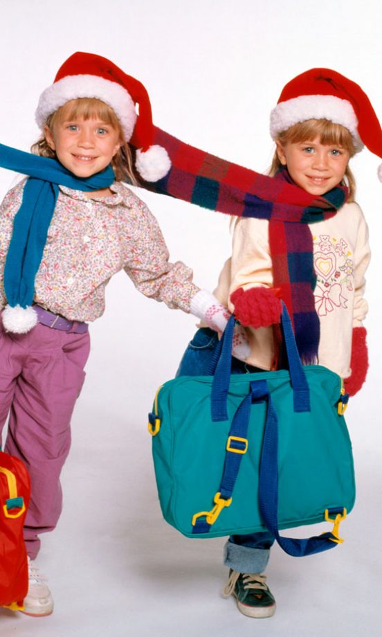 Winter Wonderland: Mary-Kate Olsen And Ashley Olsen Pose For Christmas Photos In Santa Clause Hats, 1990s