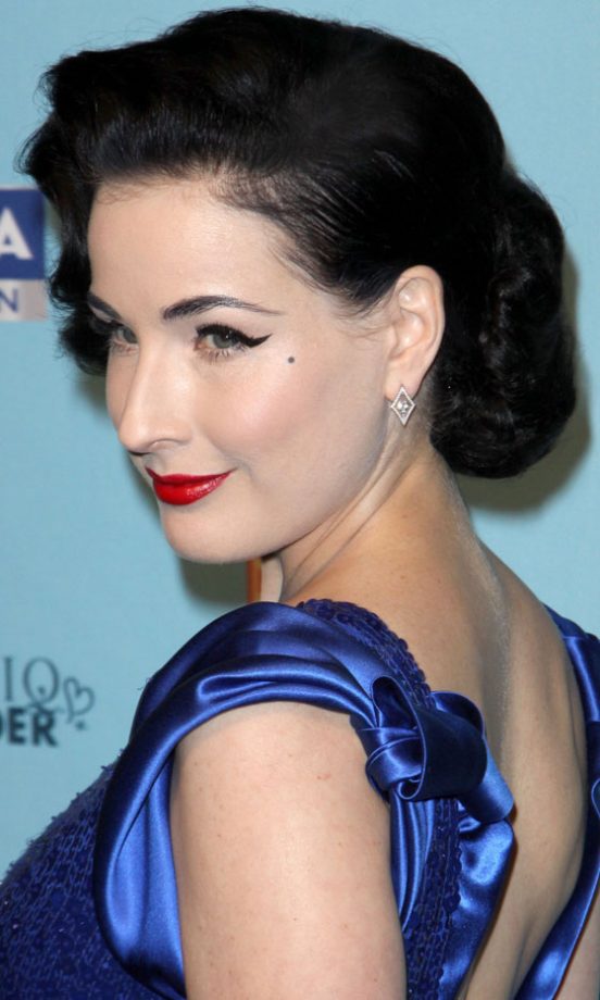 Dita Von Teese Rocks Another Retro Hairstyle Complete With A Glamorous Bun And Loose Waves, 2011