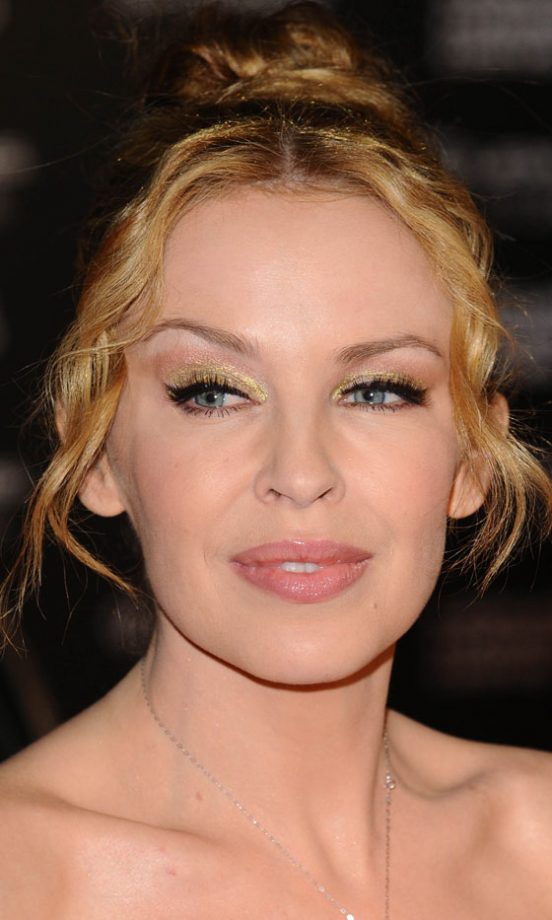Kylie Minogue Crimps Her Hair For A Relaxed Top Knot Hairstyle, 2011