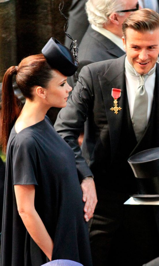 Victoria Beckham Shows Off Her Baby Bump To A Proud David Beckham At The Royal Wedding Of Kate Middleton And Prince William, 2011